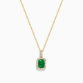 The 14K Yellow Gold Diamond and Emerald Pendant showcases a rectangular green emerald set in yellow gold, accented by small clear diamonds.