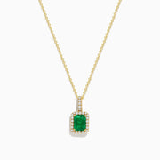 The 14K Yellow Gold Diamond and Emerald Pendant showcases a rectangular green emerald set in yellow gold, accented by small clear diamonds.