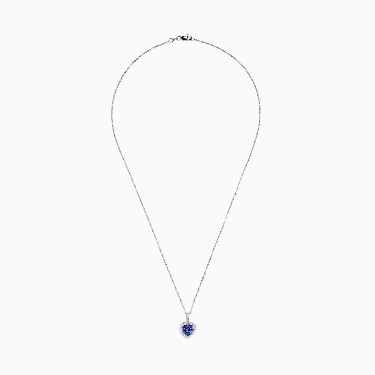 The Nahla Siri 14K White Gold Tanzanite and Diamond Heart Pendant, 2.32 TCW, features a heart-shaped blue tanzanite surrounded by sparkling diamonds, shown on a white background.