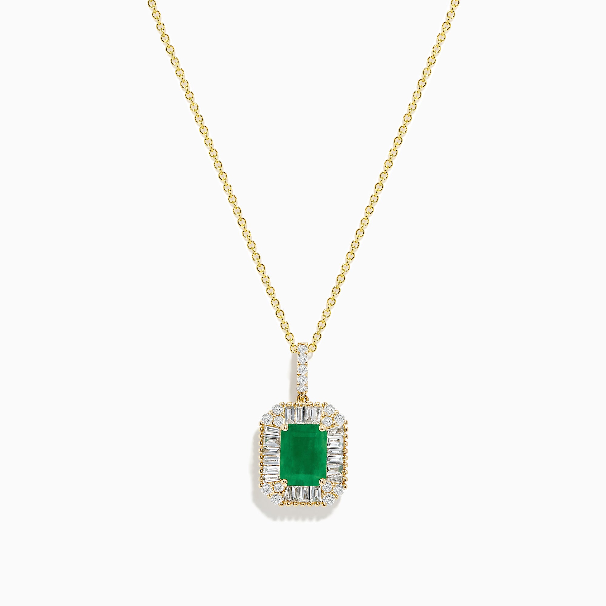 The 14K Yellow Gold Baguette Diamond Halo Emerald Pendant features a rectangular emerald framed by baguette and round diamonds, set in yellow gold with a decorative border, displayed against a white background.