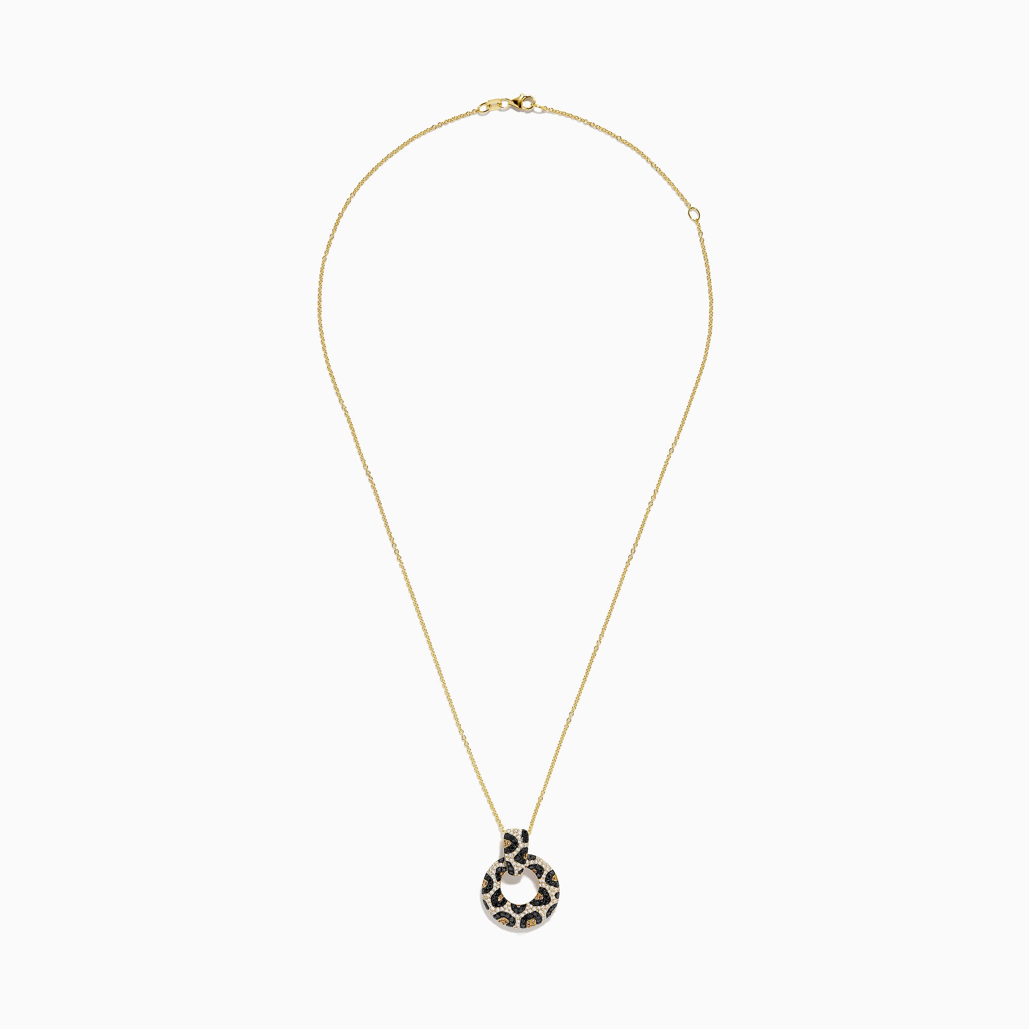 The Signature 14K Yellow Gold Diamond Spot Pendant features a circular design with black, gold, and white gemstones in a leopard print pattern. Its looped diamond detailing stands out beautifully against a plain white background.