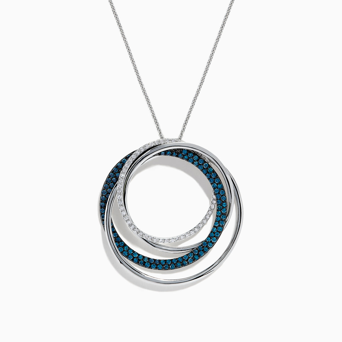 The Bella Bleu 14K White Gold Blue and White Diamond Pendant (0.98 TCW) showcases interlocking circles—one with blue diamonds, one with white—suspended from a delicate white gold chain against a white background.