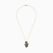 The Safari 14K Yellow Gold Black and White Diamond Dragon Pendant features a coiled dragon design with gold accents and sparkling black and white diamonds.