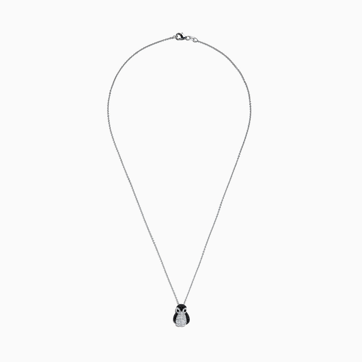 The Safari Sterling Silver Diamond and Black Sapphire Penguin Pendant, 1.03 TCW, features sparkling stones on a penguin-shaped design and is shown against a plain white background.