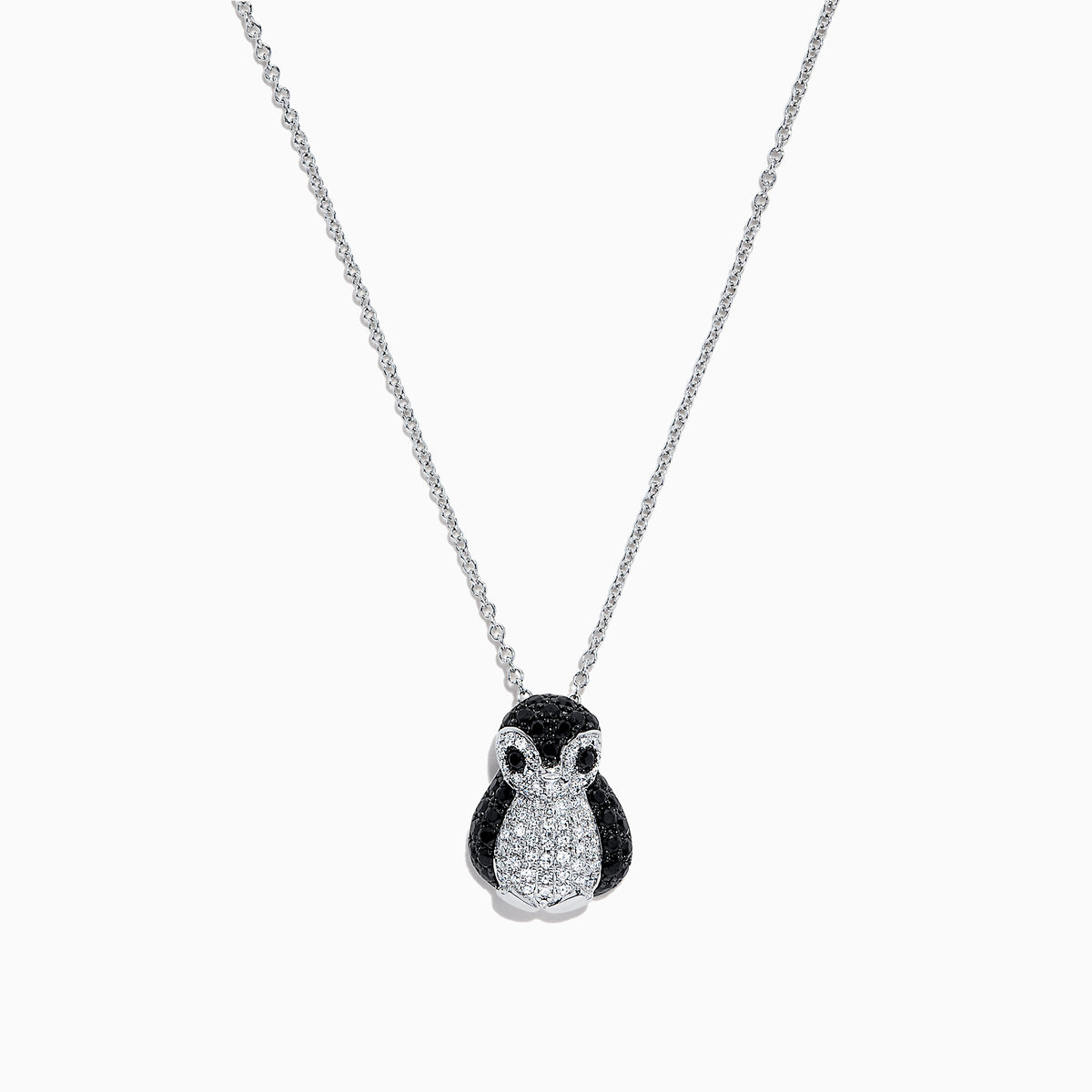 The Safari Sterling Silver Diamond and Black Sapphire Penguin Pendant, 1.03 TCW, features sparkling stones on a penguin-shaped design and is shown against a plain white background.