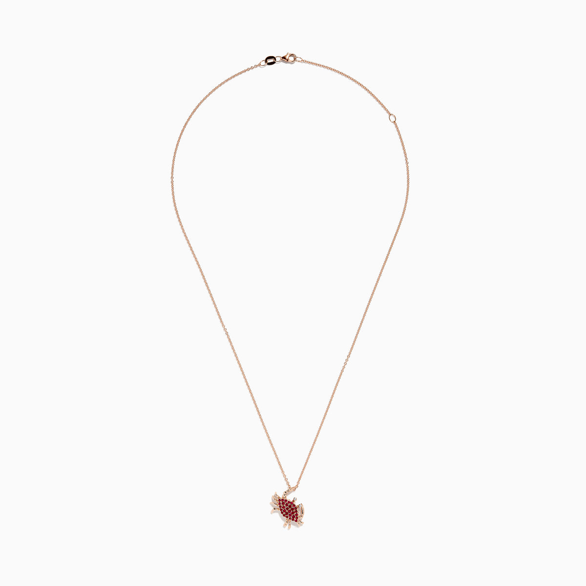 The Seaside 14K Rose Gold Diamond and Ruby Crab Pendant, featuring sparkling diamonds and rubies, is elegantly displayed against a white background.