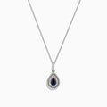 The Royale Bleu 14K Two Tone Gold Sapphire and Diamond Pendant features a teardrop-shaped blue sapphire surrounded by diamonds, set on a silver chain with elegant gold accents, totaling 0.38 TCW.