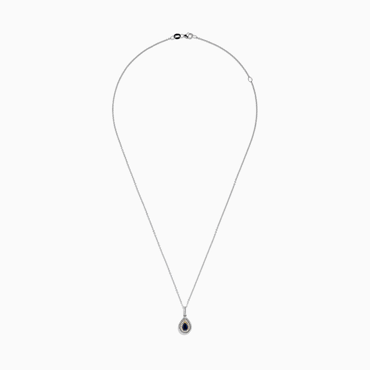 The Royale Bleu 14K Two Tone Gold Sapphire and Diamond Pendant features a teardrop-shaped blue sapphire surrounded by diamonds, set on a silver chain with elegant gold accents, totaling 0.38 TCW.