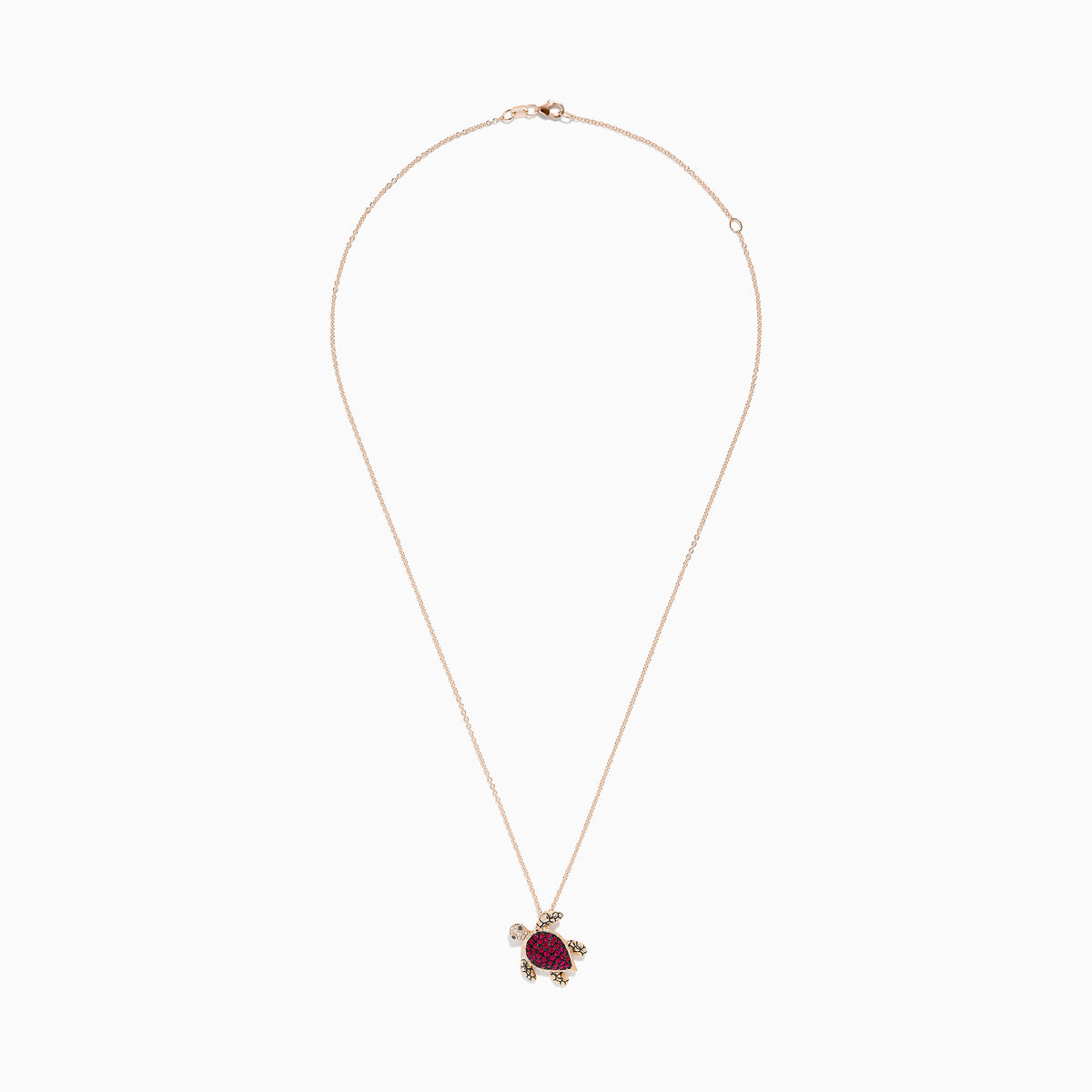 The Seaside 14K Rose Gold Ruby and Diamond Turtle Pendant features a pink ruby-studded shell, detailed gold feet, head, and tail, accented with a sparkling diamond, shown on a white background.