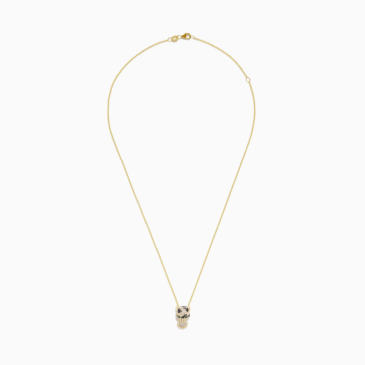 The Signature 14K Yellow Gold Diamond and Emerald Pendant features a panther’s head with diamond accents, emerald eyes, black detailing for spots, and a circular ring held in its mouth.