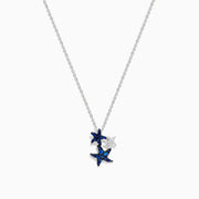 The Seaside 14K White Gold Sapphire and Diamond Starfish Pendant features three starfish—two with sparkling sapphires, one in plain white gold—hanging on a delicate chain against a white background.