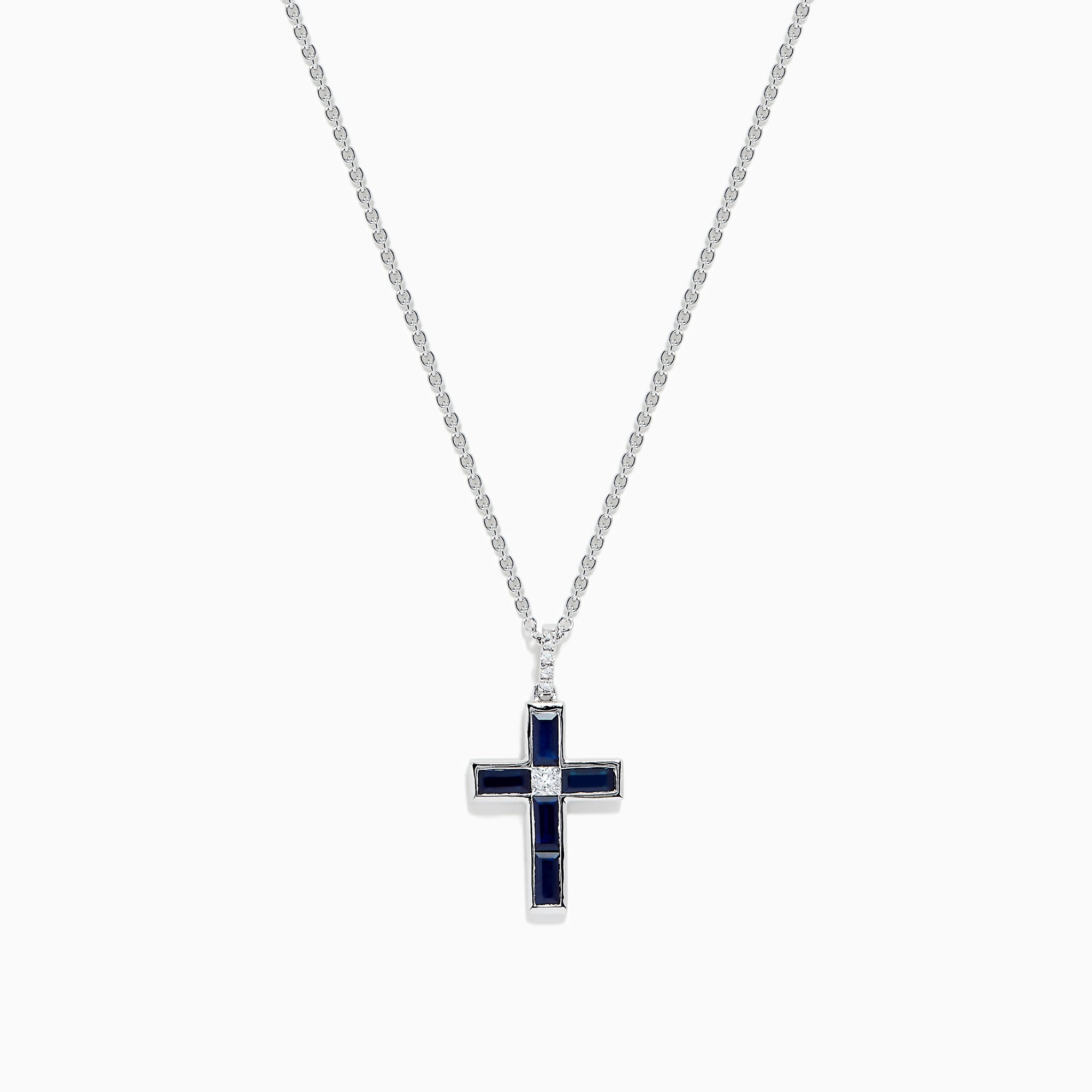 The Royale Bleu 14K White Gold Sapphire and Diamond Cross Pendant features a silver chain and striking dark blue sapphire-like rectangular stones, displayed on a plain white background.