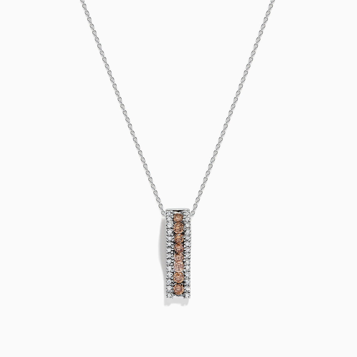 The 14K White Gold Espresso and White Diamond Pendant, 0.62 TCW, features a vertical rectangular design with a center row of rich brown diamonds bordered by sparkling white diamonds, all set in delicate white gold.