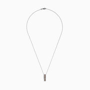 The 14K White Gold Espresso and White Diamond Pendant, 0.62 TCW, features a vertical rectangular design with a center row of rich brown diamonds bordered by sparkling white diamonds, all set in delicate white gold.
