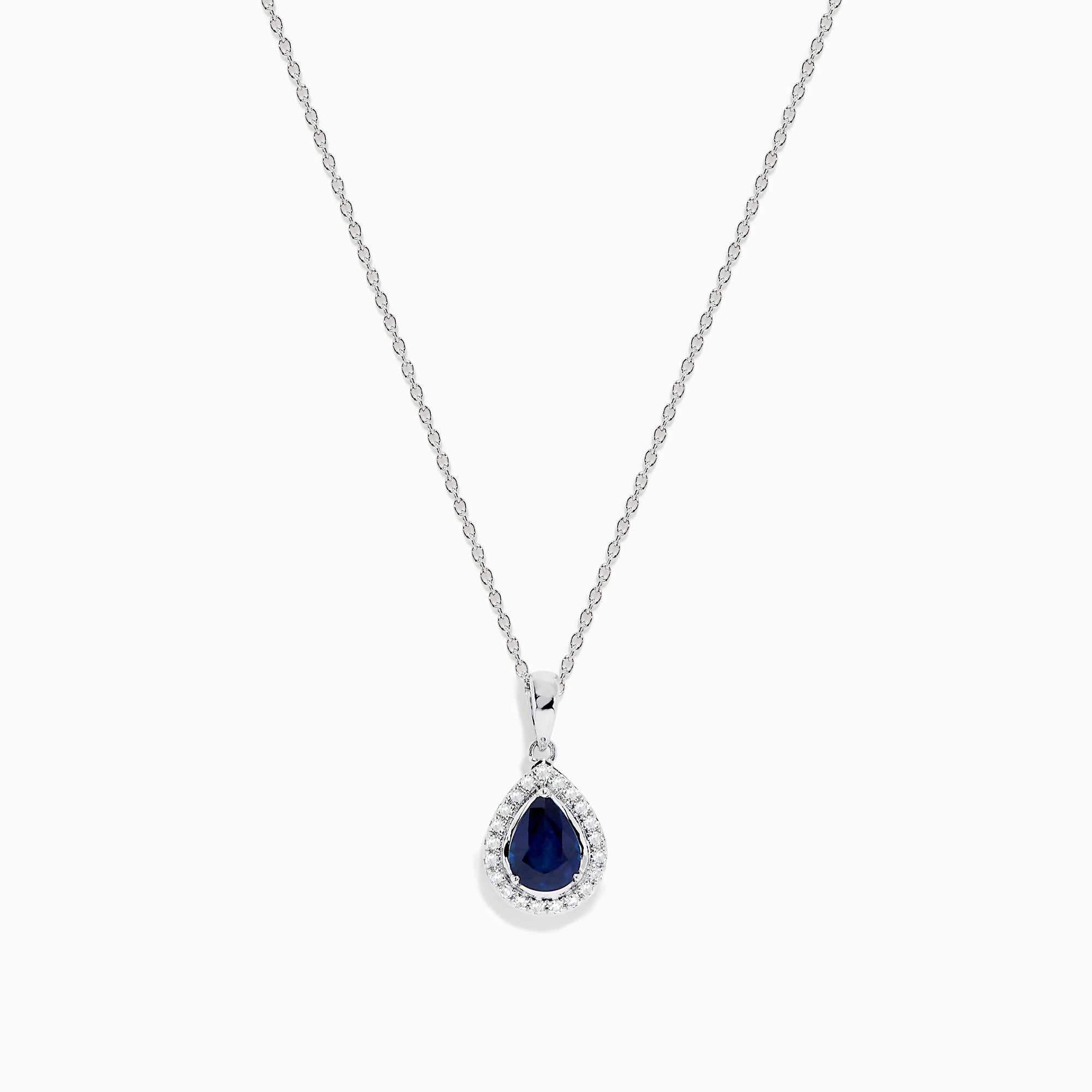 The Royale Bleu 14K White Gold Sapphire and Diamond Pendant features a teardrop sapphire encircled by shimmering diamonds, elegantly displayed on a white background.