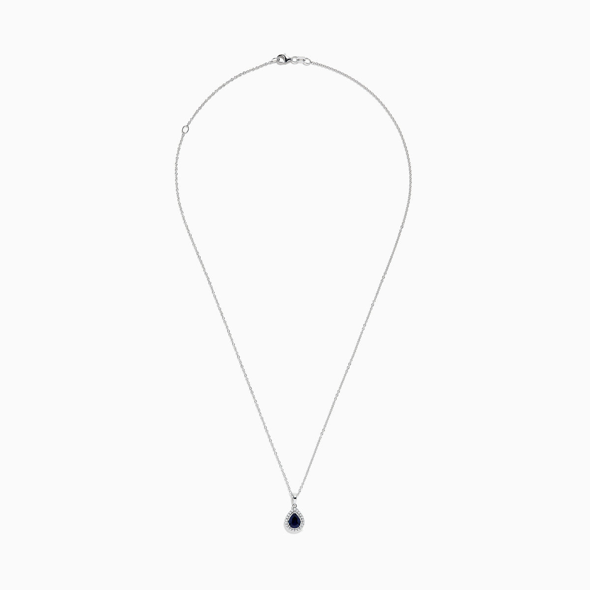 The Royale Bleu 14K White Gold Sapphire and Diamond Pendant features a teardrop sapphire encircled by shimmering diamonds, elegantly displayed on a white background.