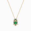 The Safari 14K Yellow Gold Emerald and Diamond Owl Pendant features a gold chain and owl design with an emerald-hued center gem and sparkling diamond accents on a gold branch.