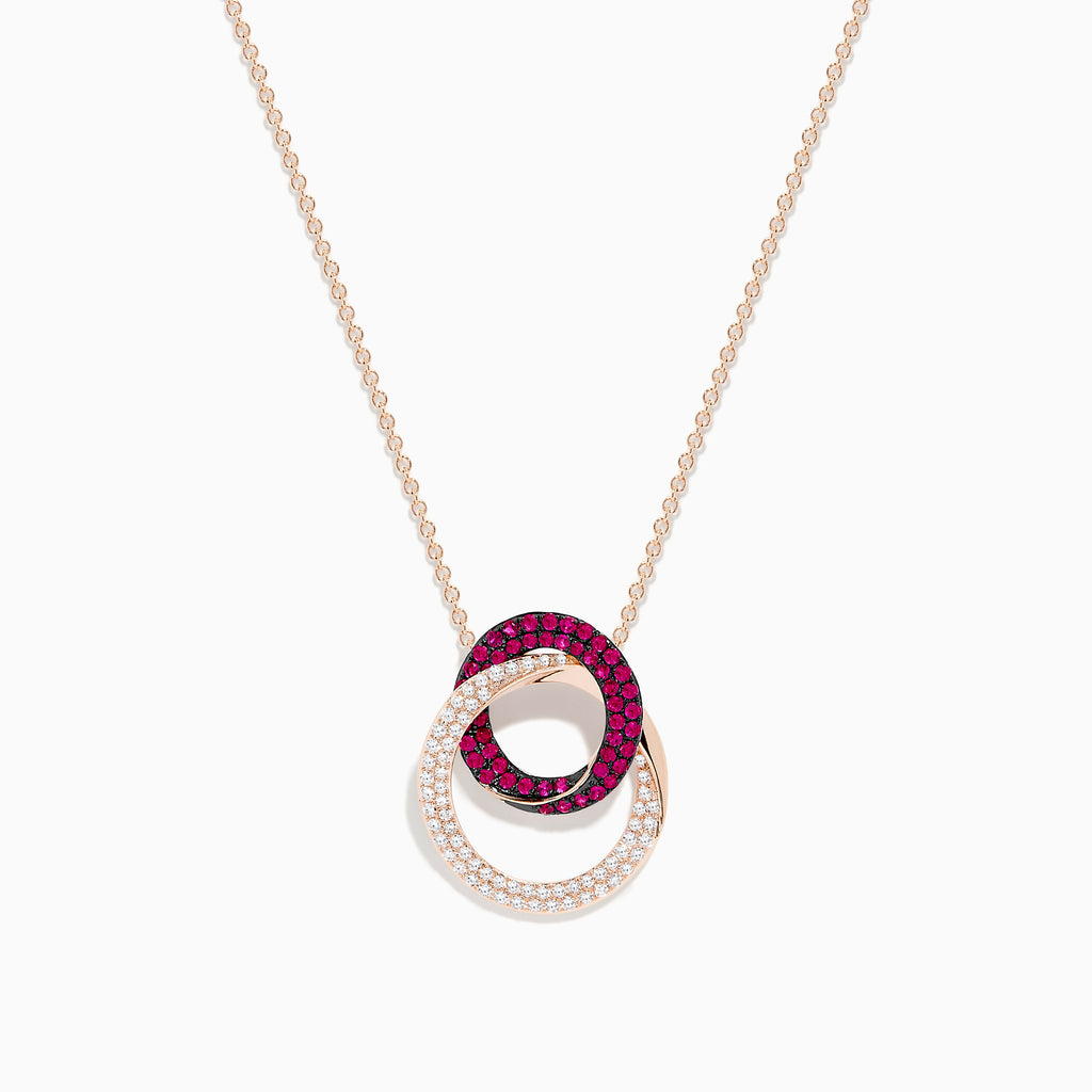 The Ruby Royale 14K Rose Gold Ruby and Diamond Intertwined Circles Pendant features two interlocking circles—one with rubies, one with diamonds—set against a white background, ideal for diamond jewelry lovers.