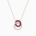 The Ruby Royale 14K Rose Gold Ruby and Diamond Intertwined Circles Pendant features two interlocking circles—one with rubies, one with diamonds—set against a white background, ideal for diamond jewelry lovers.