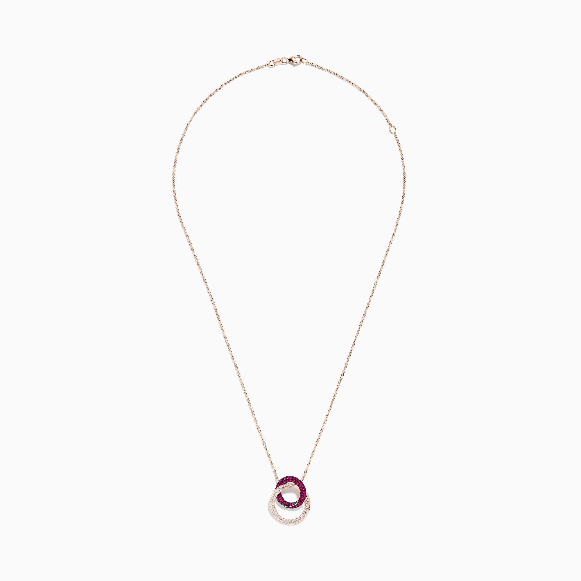 The Ruby Royale 14K Rose Gold Ruby and Diamond Intertwined Circles Pendant features two interlocking circles—one with rubies, one with diamonds—set against a white background, ideal for diamond jewelry lovers.