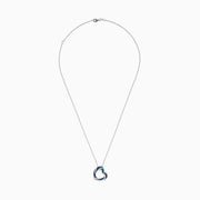 The Bella Bleu 14K White Gold Blue and White Diamond Heart Pendant is a delicate necklace featuring sparkling blue and white diamonds, shown against a plain white background.