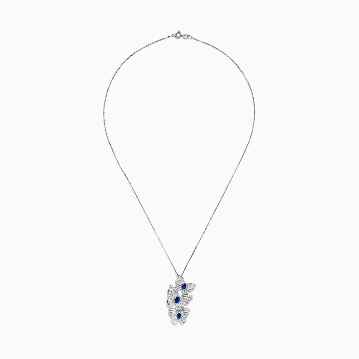 The 14K White Gold Blue Sapphire and Diamond Multi Butterfly Pendant features three butterflies accented with diamond-like stones and a central blue sapphire, hanging elegantly from a delicate chain.