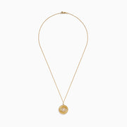 The 14K Yellow Gold Diamond Evil Eye Pendant features a round eye design accented with sparkling diamonds, set against a textured yellow gold background with a beaded edge.