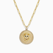 The Safari 14K Yellow Gold Diamond Lions Head Pendant features a detailed lion’s head in the center, bordered by sparkling diamonds and hangs from an elongated yellow gold chain.