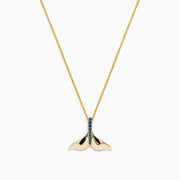 The Seaside 14K Yellow Gold Blue Diamond Whales Tail Pendant (0.05 TCW) features a vertical row of shimmering blue diamonds on a yellow gold chain, displayed against a plain white background.