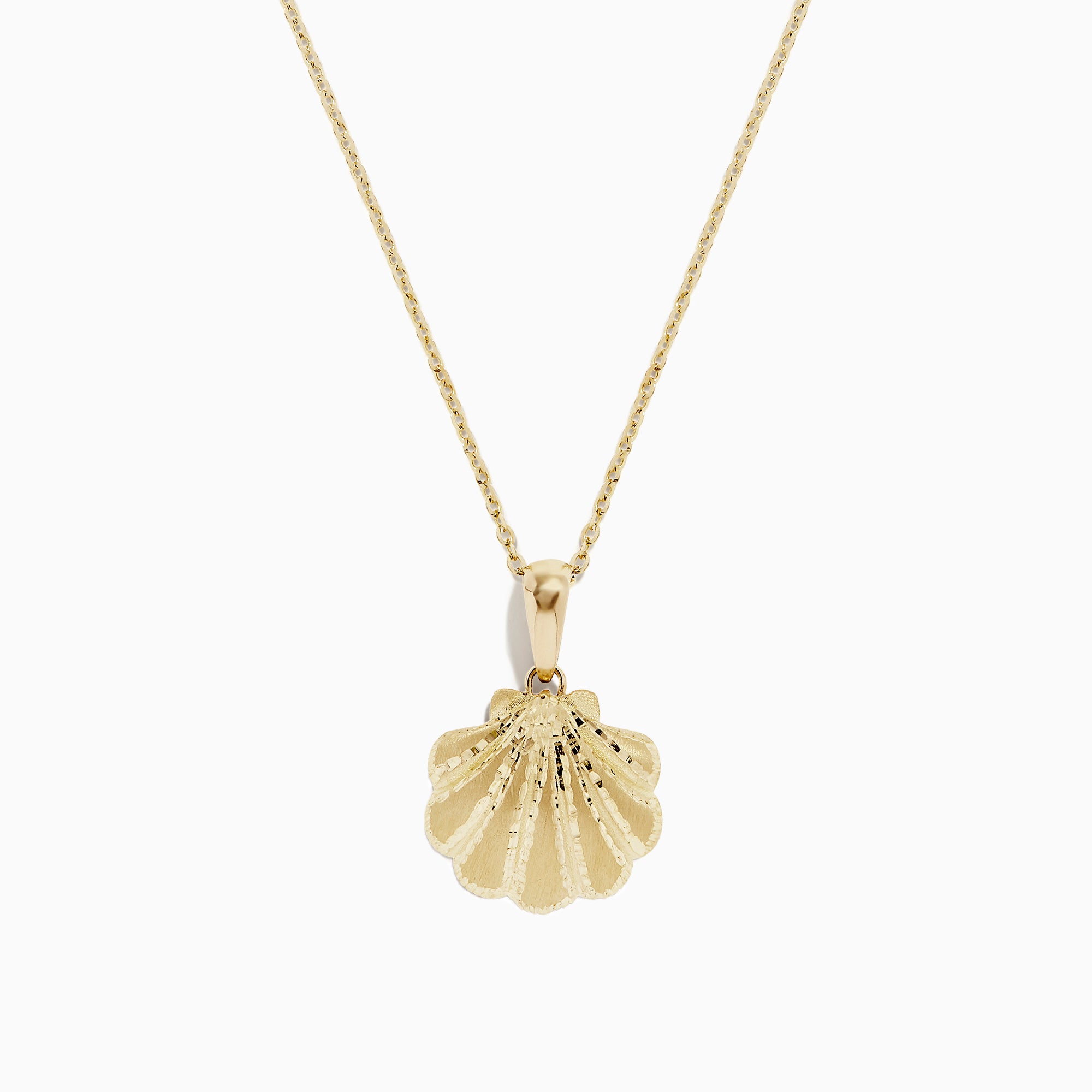 The Seaside 14K Yellow Gold Scallop Shell Pendant is a necklace with a thin chain and a textured, scallop shell-shaped pendant.