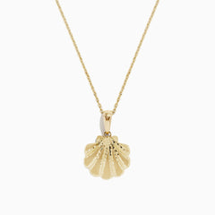 The Seaside 14K Yellow Gold Scallop Shell Pendant is a necklace with a thin chain and a textured, scallop shell-shaped pendant.