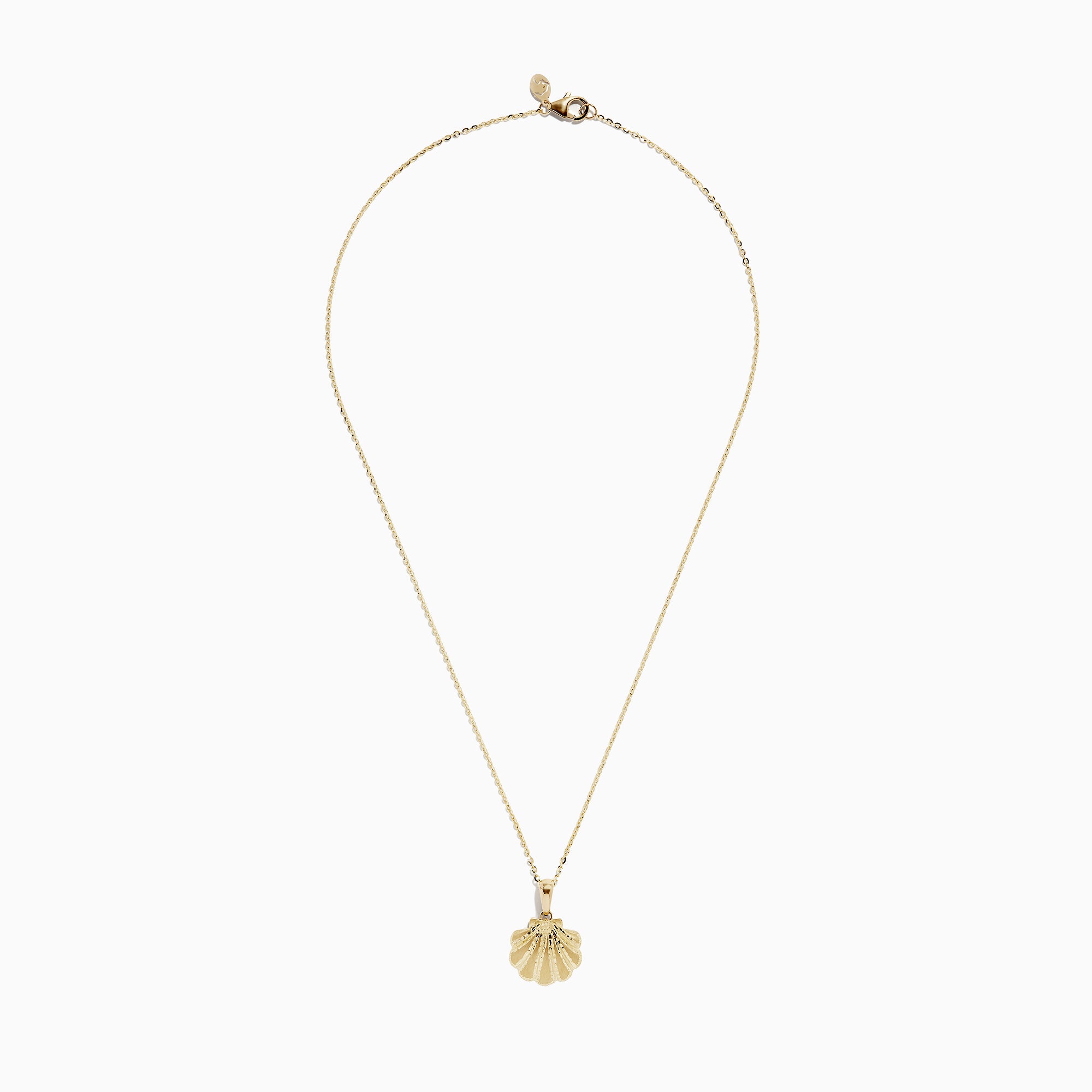 The Seaside 14K Yellow Gold Scallop Shell Pendant is a necklace with a thin chain and a textured, scallop shell-shaped pendant.