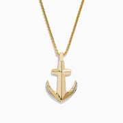 Mens 14K yellow gold diamond anchor pendant, 0.11 TCW, features an anchor and cross design with sparkling stones on the lower sides, suspended from a classic medium-link gold chain.