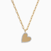 The Novelty 14K Yellow Gold Diamond Heart Pendant features a large paperclip chain design with a sparkling diamond-outlined heart pendant at the center, crafted in elegant 14K yellow gold.