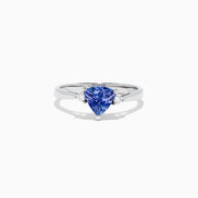 The Nahla Siri 14K White Gold Trillion Tanzanite and Diamond Ring, 1.07 TCW, features a triangular-cut tanzanite center accented by two round diamonds, shown on a white background.
