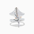 The 925 Sterling Silver & 14K Gold Diamond Stingray Wrap Ring features a flowing stingray design with 0.03 TCW diamonds and rose gold accents, its sculptural band elegantly curving to mimic the graceful movement of a stingray.
