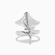 The 925 Sterling Silver & 14K Gold Diamond Stingray Wrap Ring features a flowing stingray design with 0.03 TCW diamonds and rose gold accents, its sculptural band elegantly curving to mimic the graceful movement of a stingray.
