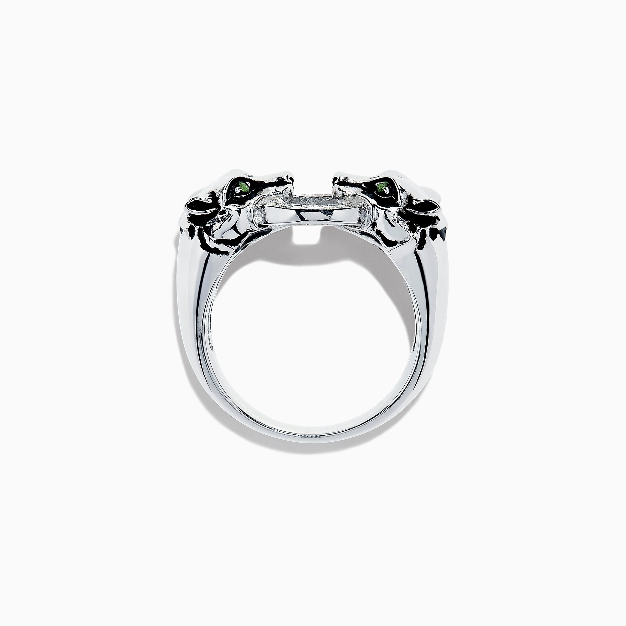 The Signature Sterling Silver Diamond Panther Ring, 0.09 TCW, features two panther heads with green gemstone eyes gripping a diamond-set circle in their mouths—an elegant and detailed design against a white backdrop.