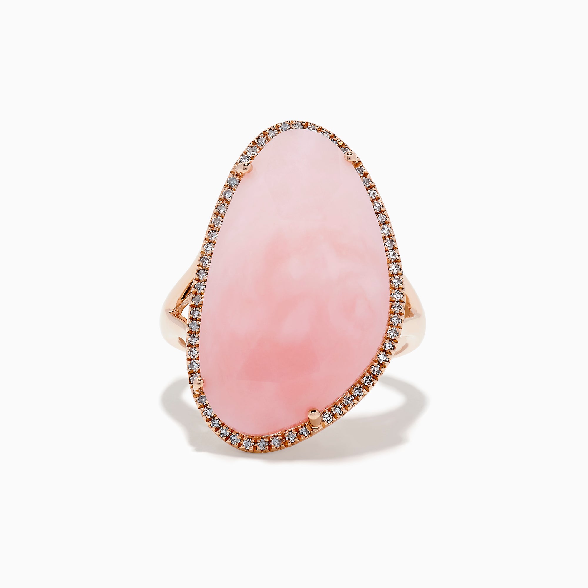 The 14K Rose Gold Pink Opal and Diamond Ring showcases a large, asymmetrical pink opal accented with small diamonds on a simple rose gold band, displayed against a white background.