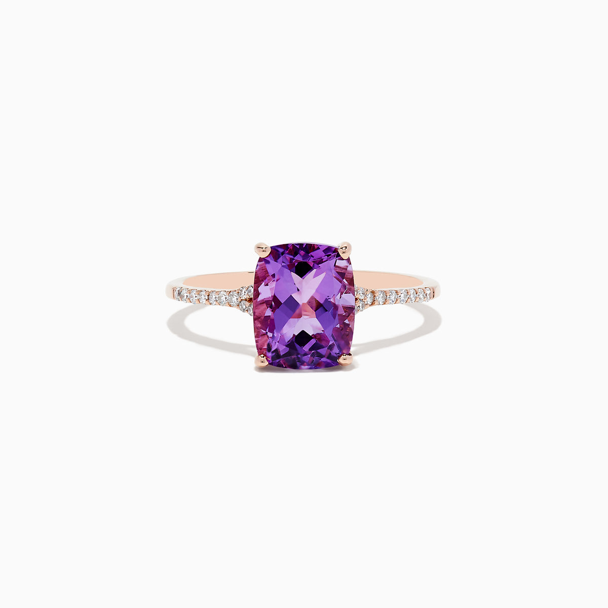 The 14K Rose Gold Amethyst and Diamond Ring, 2.21 TCW, showcases a large cushion-cut amethyst centerpiece with small round diamonds on the band, displayed against a white background.