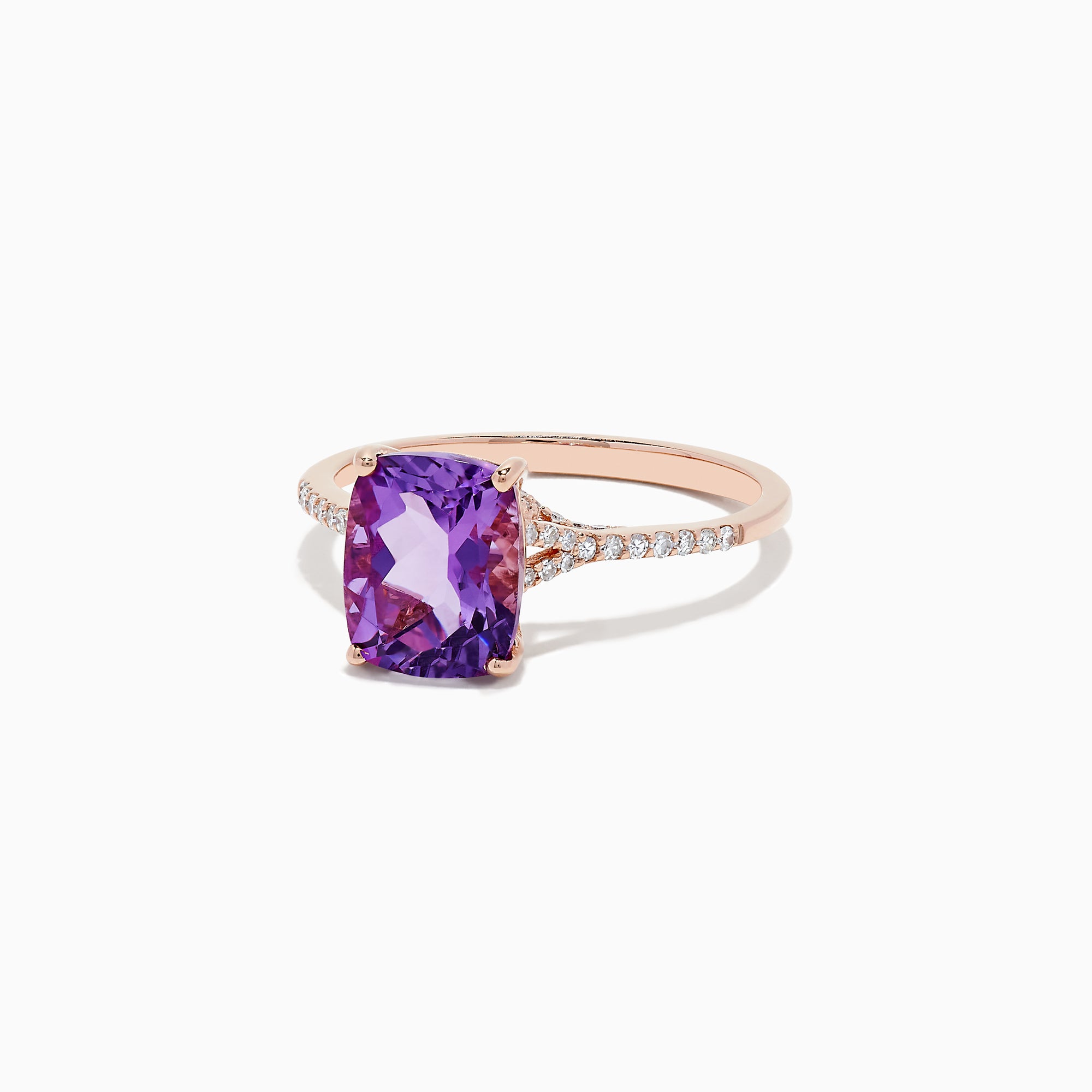 The 14K Rose Gold Amethyst and Diamond Ring, 2.21 TCW, showcases a large cushion-cut amethyst centerpiece with small round diamonds on the band, displayed against a white background.