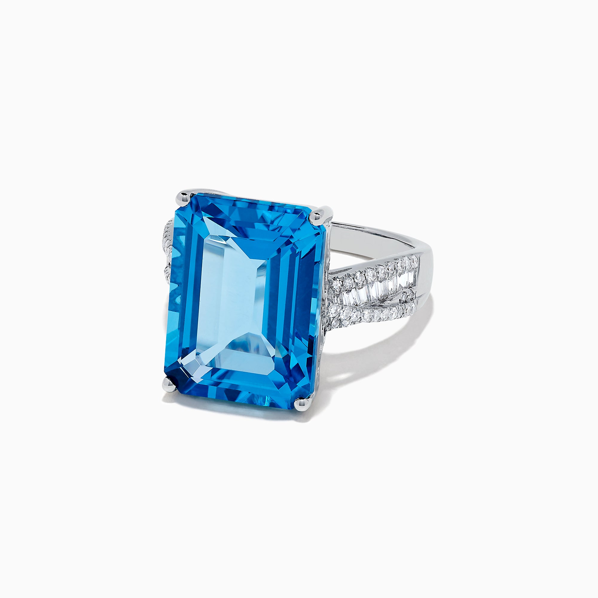The Ocean Bleu 14K White Gold Blue Topaz and Diamond Ring, 13.65 TCW, showcases a large emerald-cut blue topaz with side baguette diamonds on a white gold band, set against a plain white background.