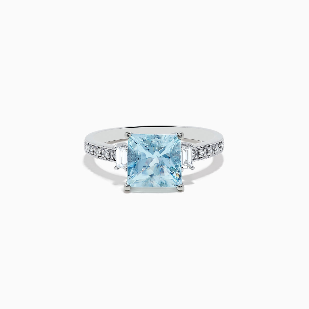 The Aquarius 14K White Gold Diamond and Aquamarine Ring showcases a square light blue aquamarine center, two rectangular clear side stones, and sparkling white diamond accents along the band.