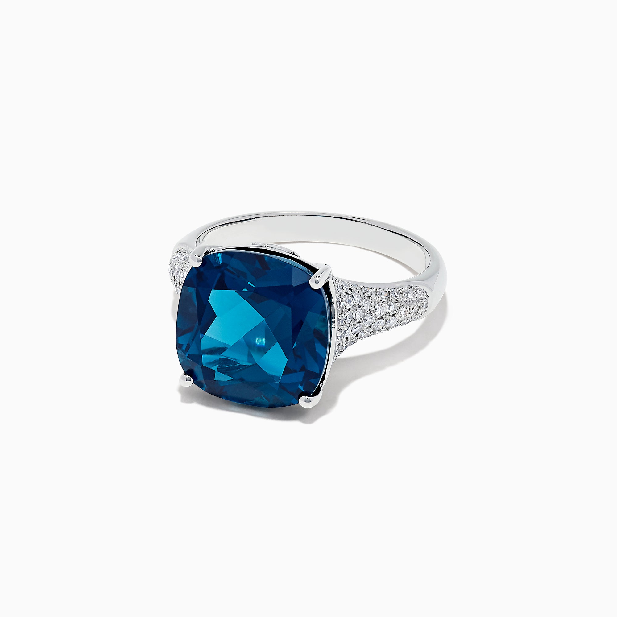 The Ocean Bleu 14K Gold London Blue Topaz and Diamond Ring (8.69 TCW) features a bold cushion-cut center stone accented by round white diamonds along the band, displayed on a plain white background.