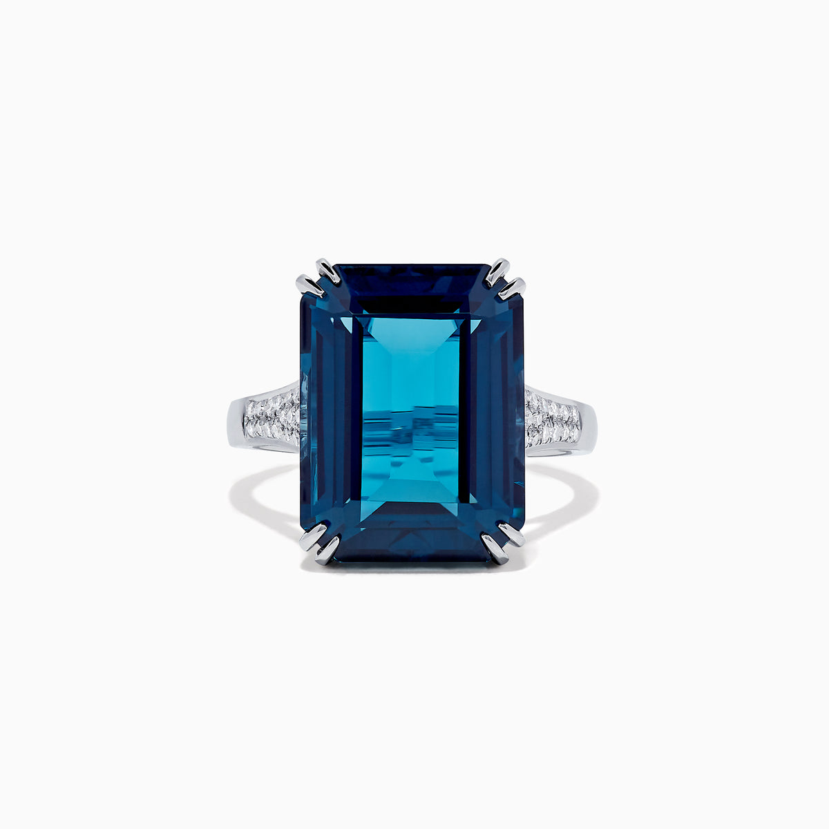 The Ocean Bleu 14K Gold London Blue Topaz and Diamond Ring, 15.14 TCW, features a rectangular emerald-cut topaz center and side diamonds, displayed against a plain white background.