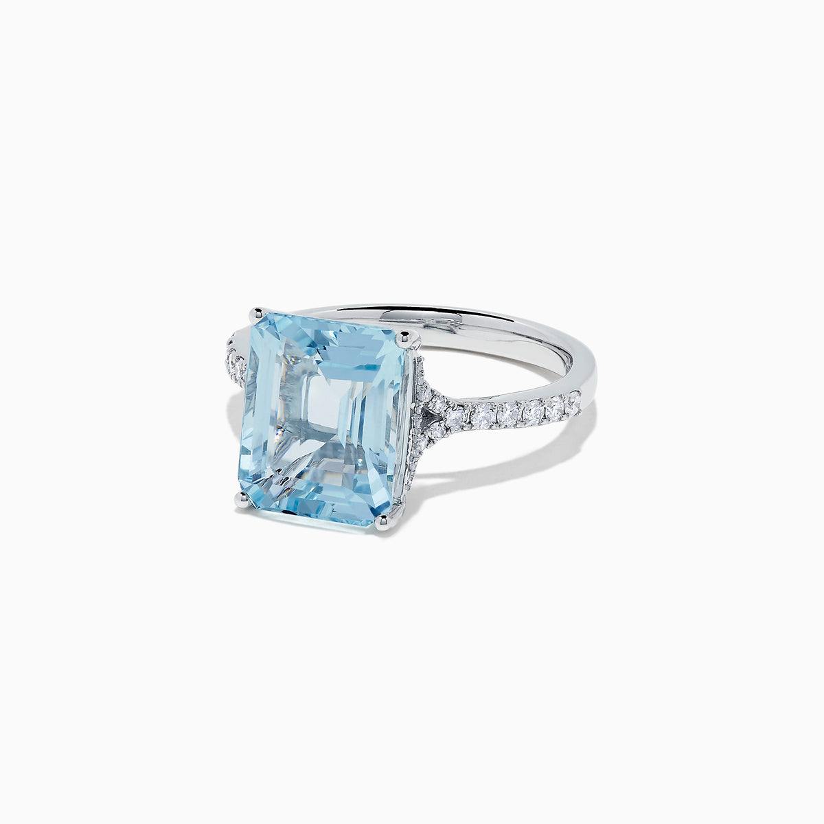 The Aquarius 14K White Gold Aquamarine and Diamond Ring, 4.12 TCW, features a large emerald-cut aquamarine with sparkling round diamonds on the band, shown against a plain white background.