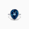 The Ocean Bleu 14K Gold London Blue Topaz and Diamond Ring, 11.21 TCW, features a pear-shaped blue topaz with a diamond halo on a gold band, shown on a plain white background.