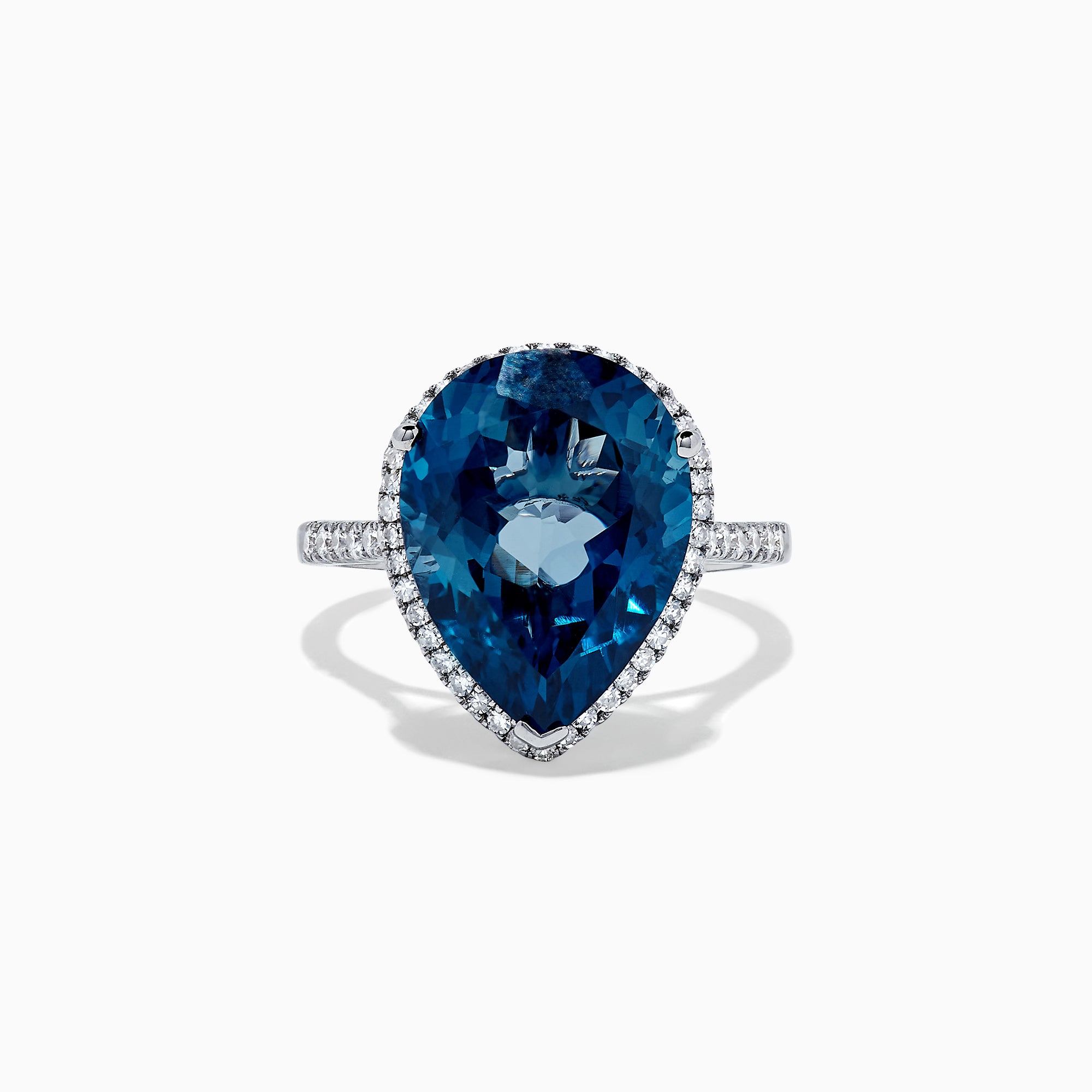 The Ocean Bleu 14K Gold London Blue Topaz and Diamond Ring, 11.21 TCW, features a pear-shaped blue topaz with a diamond halo on a gold band, shown on a plain white background.