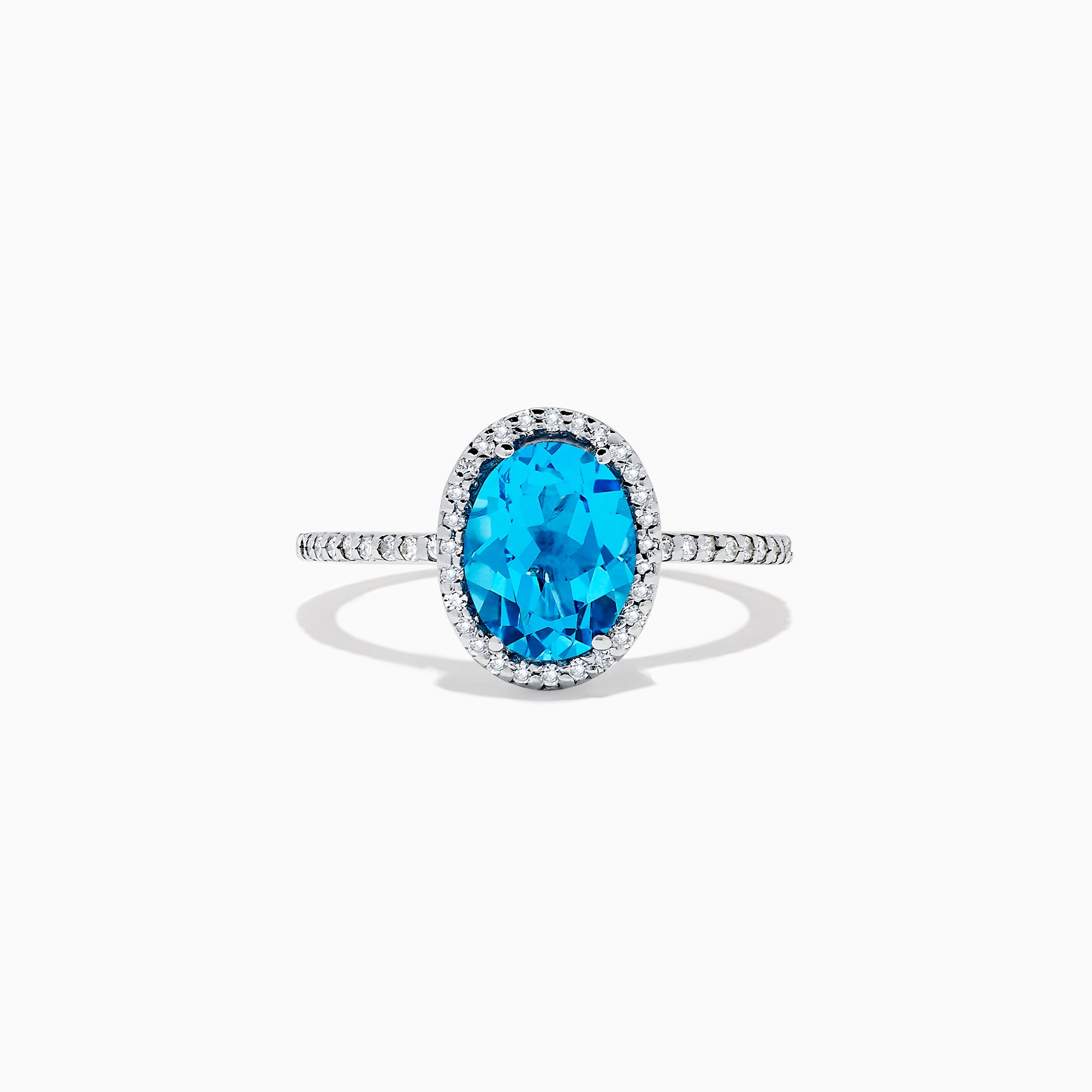 The Ocean Bleu 14K White Gold Blue Topaz and Diamond Ring, 2.51 TCW, showcases an oval blue topaz center with a diamond halo and additional diamonds along the band.
