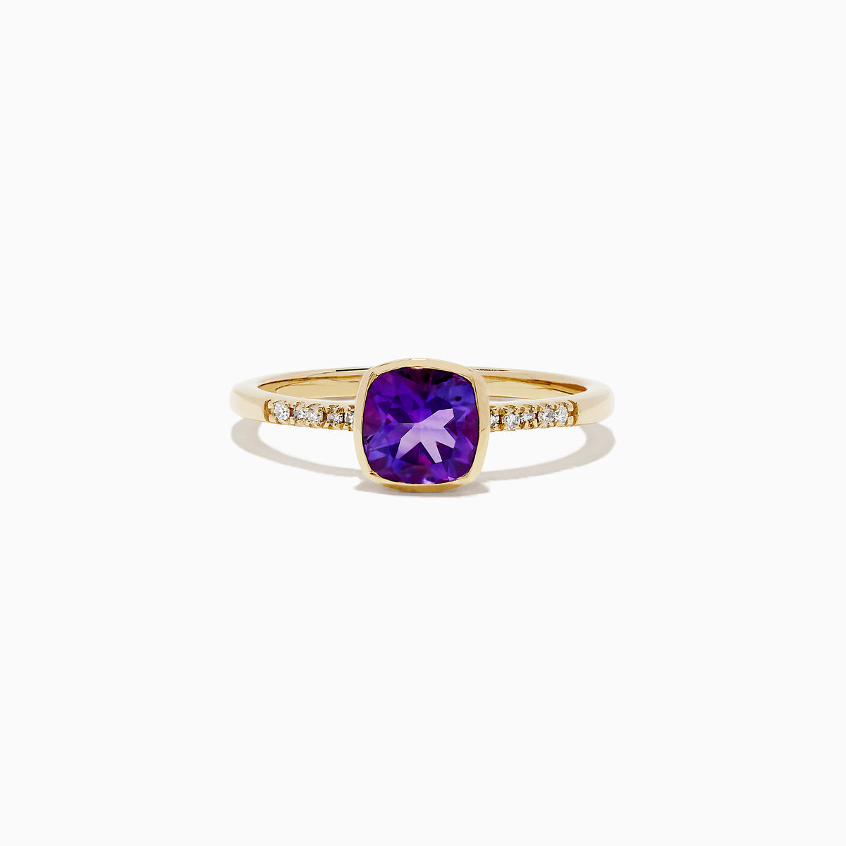 The 14K Yellow Gold Amethyst and Diamond Ring, 0.75 TCW features a cushion-cut amethyst center accented by round diamonds set into the band on each side.